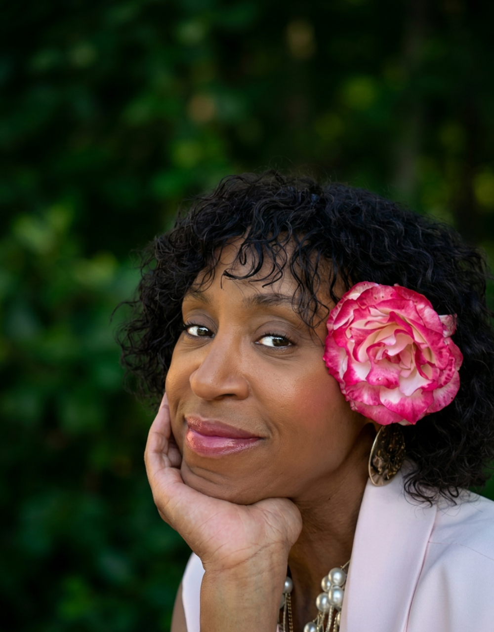 Quadia, with a rose in her hair